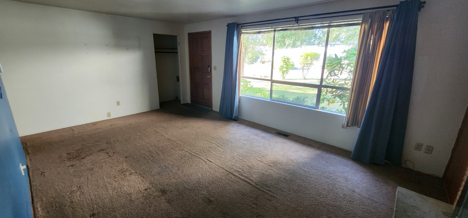 Living room before flooring renovation